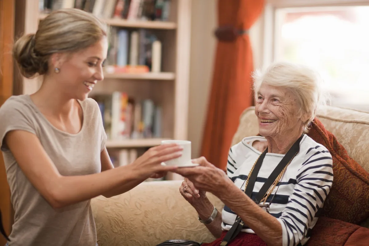 Corridor Crossing Place - Residential and Memory Care, Cedar Rapids Iowa - Sharing a cup of tea